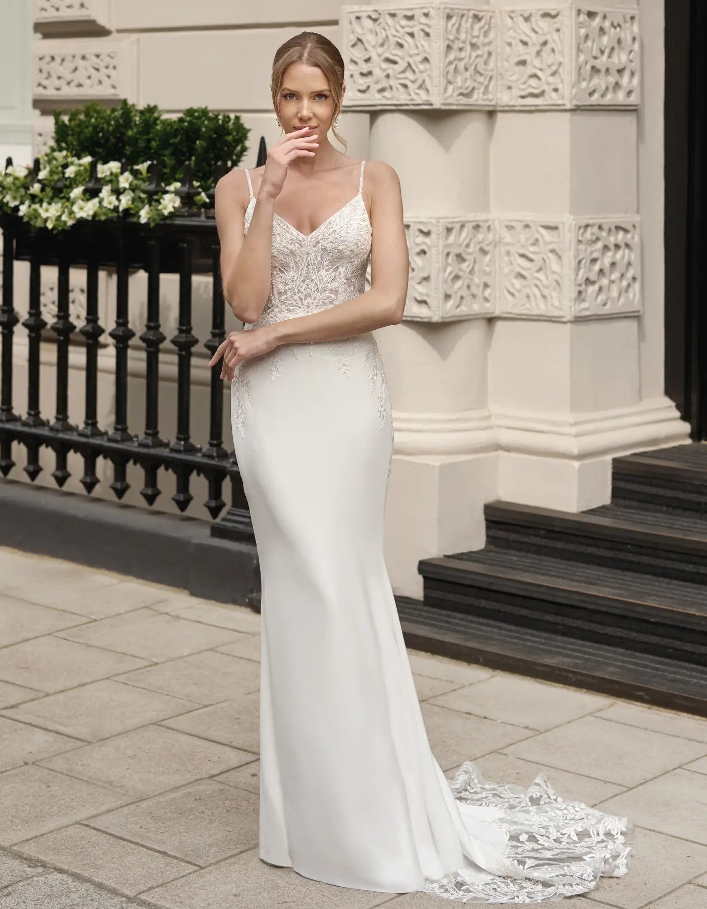 a lace and crepe gown with keyhole back